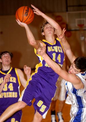 Oliver Springs' Jeff Bilyeu looks to score after drawing contact from Wartburg's Adam Vespie.