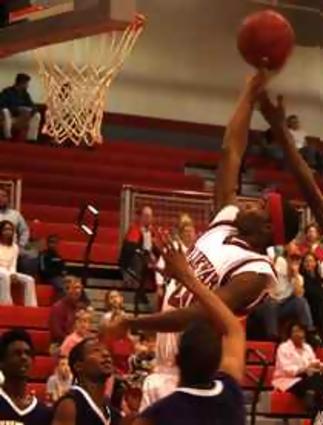 Ooltewah's Courtney White goes up for an offensive rebound against Chattanooga  Central. The Owls got the win 72-64.