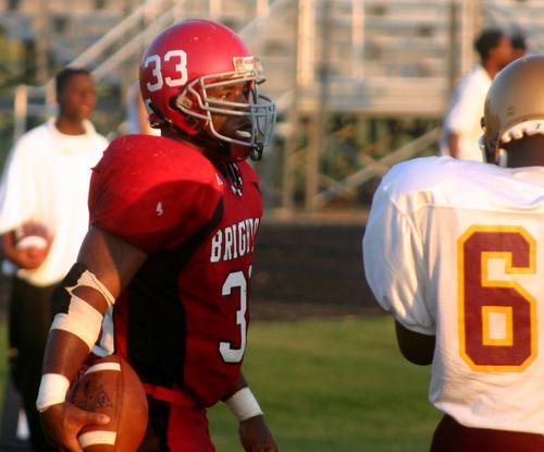 Cardinal star running back Tim Stark finds the end zone from one yard out.