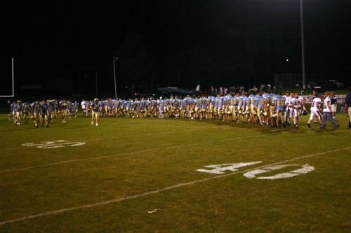 CCHS and FCHS shake hands after the game.