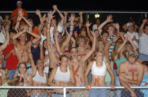 Kingston fans celebrate a touchdown.
