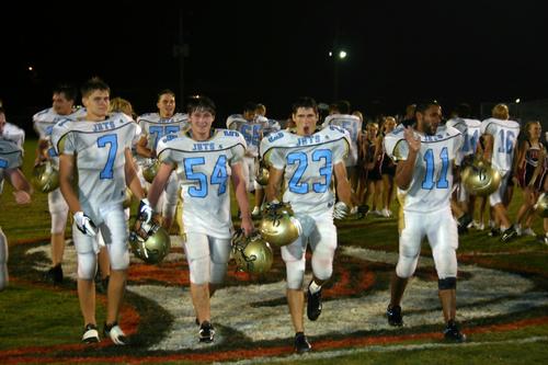 The Jets leave the field fired up!