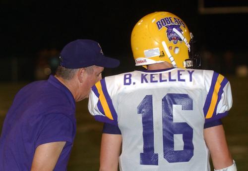 Oliver Springs head coach Frank Johnson talks with Brent Kelley.