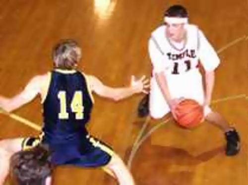 Tennessee Temple's Caleb Skogen shakes CCS's Nathan Long in their win over the Chargers 56-46. The Crusaders are now 17-1.