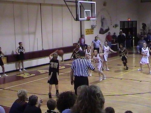 Bulldog #35 Fr. Haley Copas shoots outside the 3pt line.