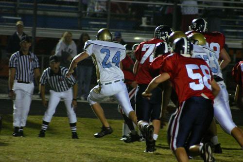 #24 Burgess is about to make a big hit on the runner