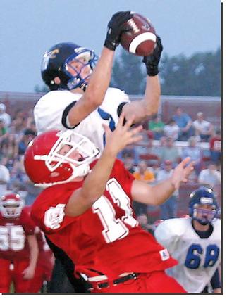 Cosby's Derek Coleman intercepts this pass over a Oakdale reciever.