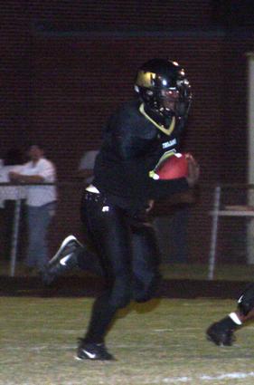 Trojans Travis Simpson breaks loose for a 70-yard touchdown run.