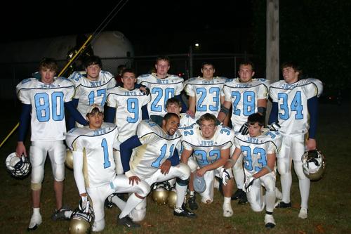 Some of the Jet Seniors pose for a picture after their last game together