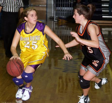 Andrea Parton skirts the defense for the basket