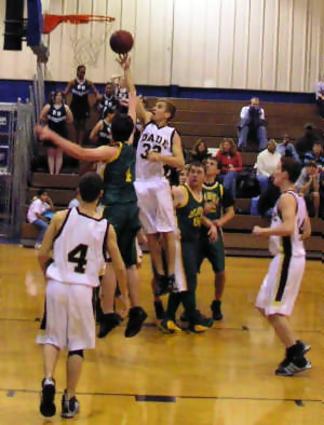 RH players watch as they give up an offensive rebound