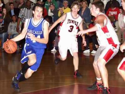 McCallie's Jordon Hobbs drives on Josh Smith of Temple.