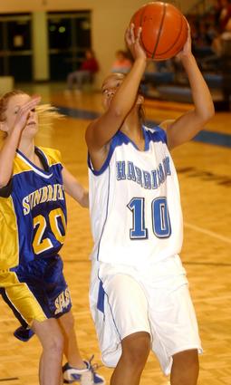 Harriman's Tiara Eskridge puts in two of her 18 points.