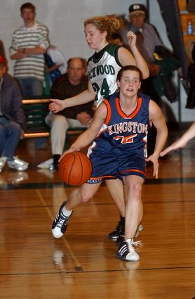 Kingston's Brooke Gentry drives the base line.