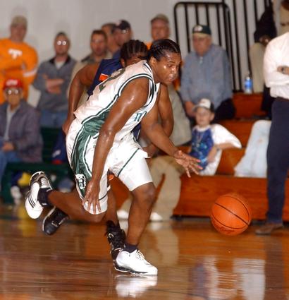 Rockwood's Ellery harvest heads down court after coming up with a steal.