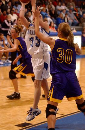 Harriman's Kendra Tilley puts up a shot.