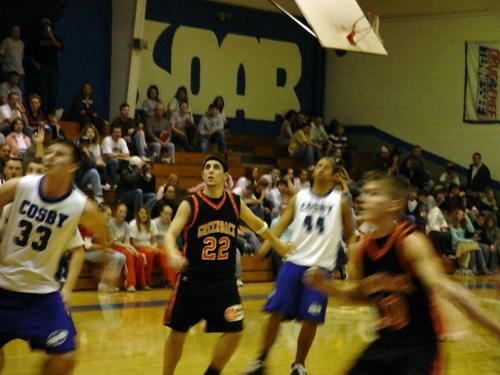 Ben Watson (black 22) guards Cosby's Kelvin Rone (white 44)