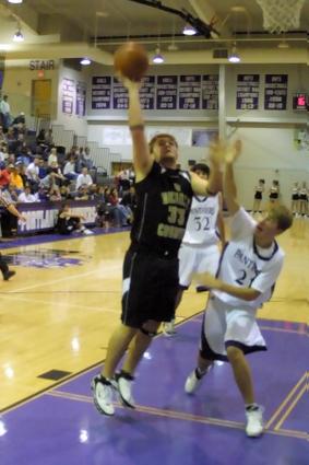 Jake Nokes lays it up for two during DeKalb County's victory over Portland.