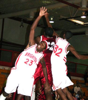 Cardinals Herman Wakefield and Travis Burns battle for a rebound.