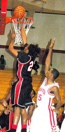 Pharaoh Duke Calhoun scores two points inside.