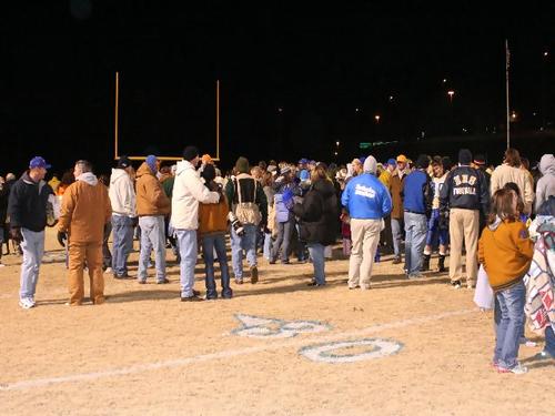 The 2005 Mustangs surrounded by their fans