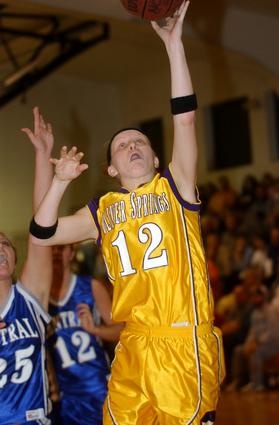 Jessie Hackworth shoots a lay-up for Oliver Springs.