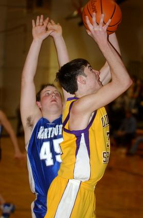 Oliver Springs' Sanie Gaylor puts up a shot from inside.