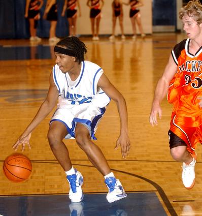 Harriman's Shawn Williams looks to make a move to the basket.