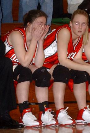 Oakdale's Valerie Ruppe wipes away tears at the end of her final game.