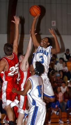 Harriman's Julian Goins puts up a shot from in close.