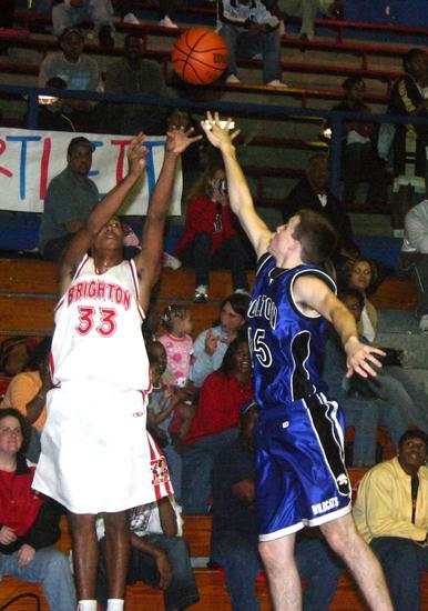 Cardinal Scott Doby drops off a three-pointer.
