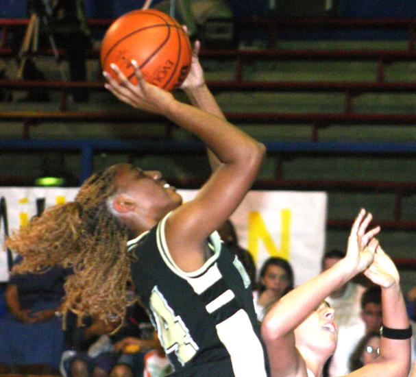 Millington's Jerrica Spencer goes up for two.