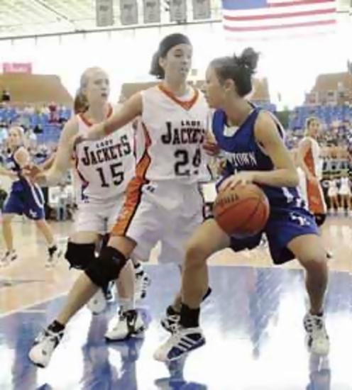 Haley Lovett handles the ball against pressure