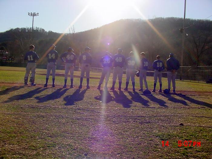 Wartburg's Team pays their respects during the Nation Anthem at Harriman.