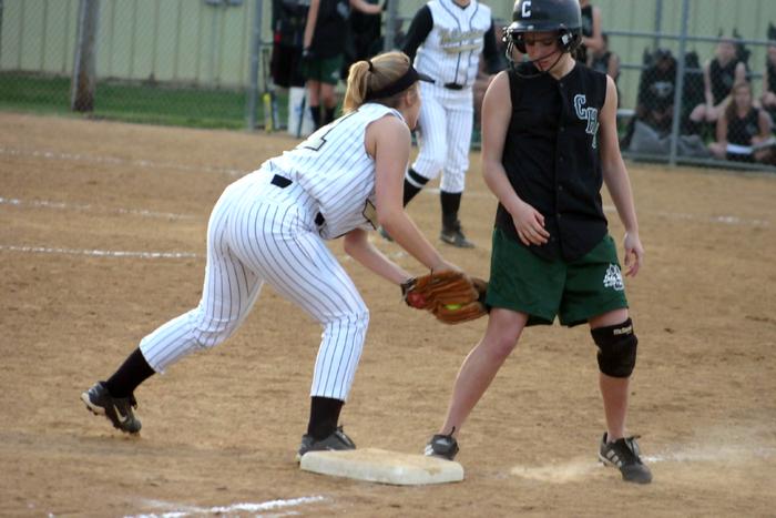 Millington third baseman Stevi Millican misses an out by inches.