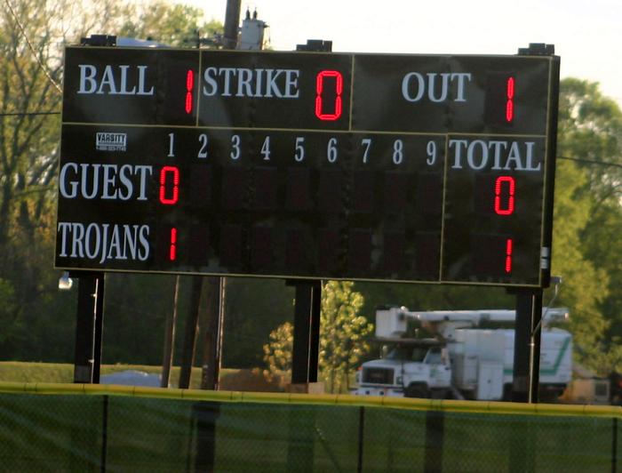 Millington scores the first run on its brand new scoreboard in the first.
