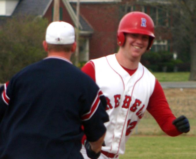 TRA's Stephen Sutton smiles after hitting a three-run homer.