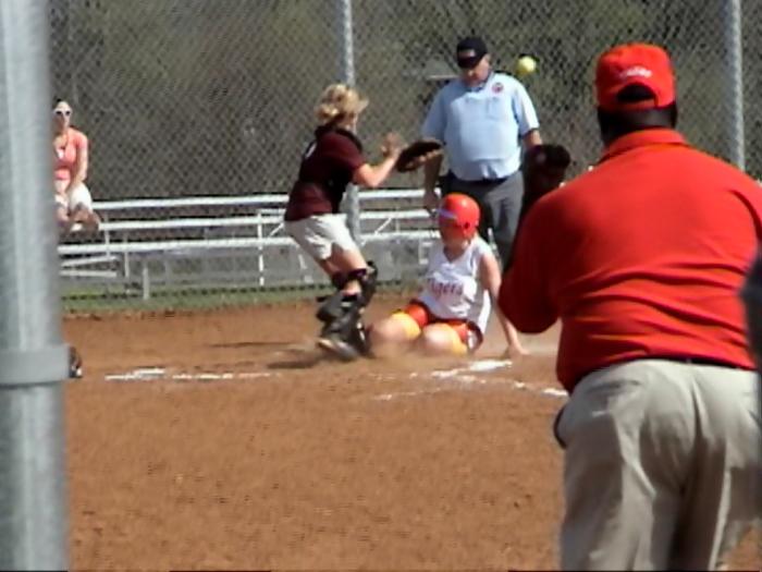 Hailey makes hard slide at home plate