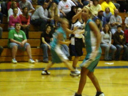 Macie Webb shoots over two defenders
