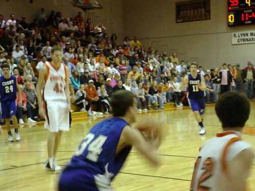 Timmy Blakely (11) calls for a pass from Jody Lowe (34)