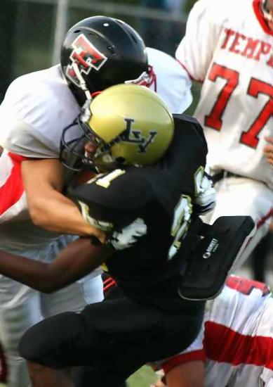 Seth Skogen with a tackle for Temple