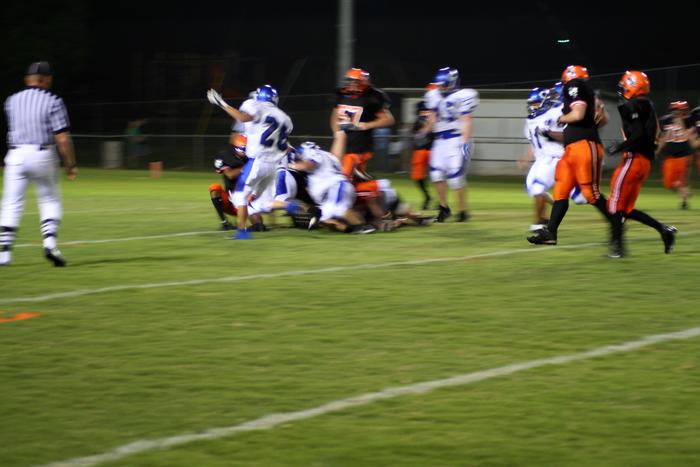 #8 Billy Stevens trying to get the corner on a punt return.
