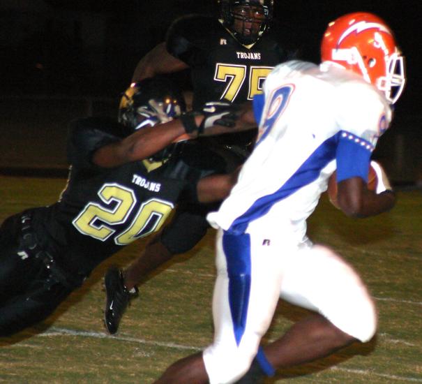 Unex Mayes (20) makes the stop for Millington.