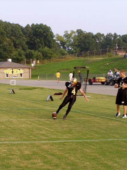 #4 Eric Gasiecki  warms-up before the game.