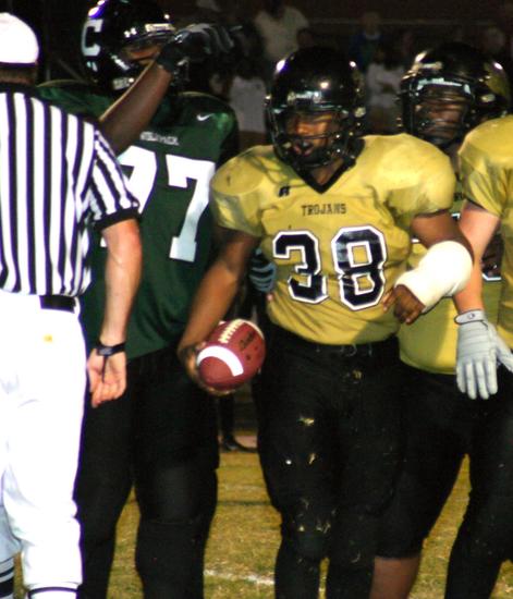 Trojan linebacker Melvin Johnson ends the game with a fumble recovery.