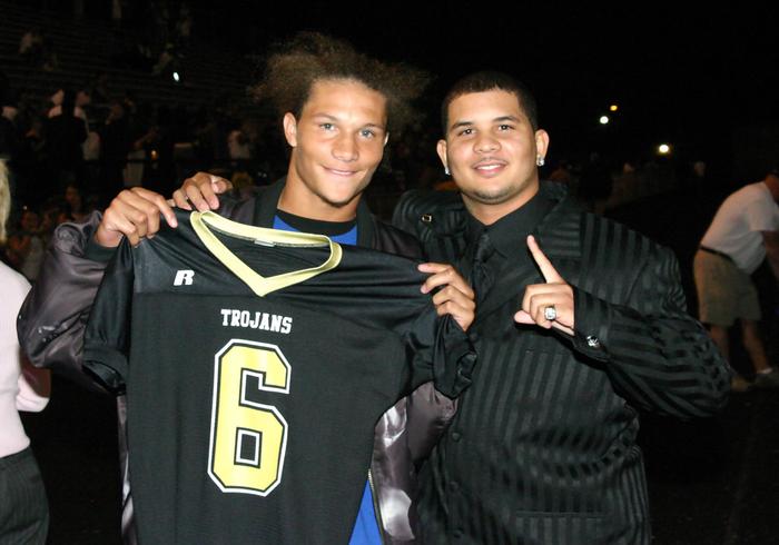 Trojan quarterback Randon Fryerson poses with his older brother Randy the night before the East game.