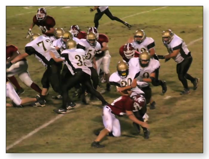 Blake McCarter tackles for a loss