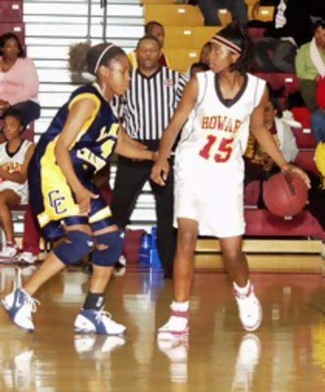 Chattanooga Christian's Niki Rumph guards Howard's Caterine Williams Friday night in a district 6-AA basketball game The Lady Chargers of CCS rallied to win in the final minute 42-40.
