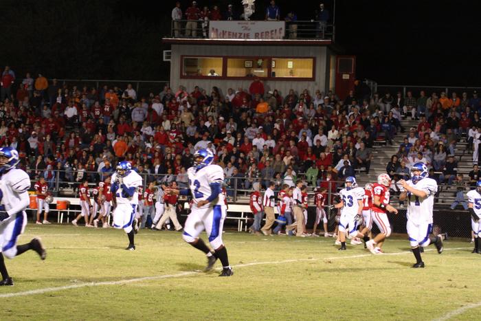 #71 Michael Reynolds, #62 Almonzo Willis #2 Trey Johnson, and #22 Josh Williams are excited when the Rebels 