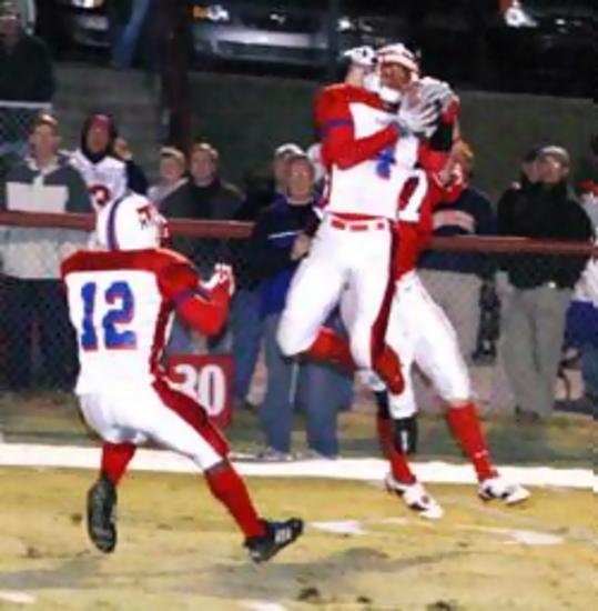 Mt. Pleasantýs Christian Gaines (4) intercepts a pass in front of Columbia Academyýs Bryce Davidson